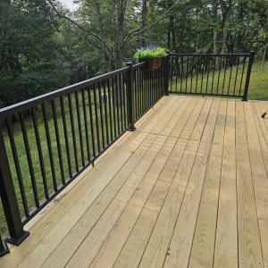 Elegant new deck with sleek aluminum handrails installed by Appalachian Contractors, enhancing outdoor living spaces